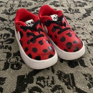 Nike Force 1 size 5C shoes. Red and Black lady bug.